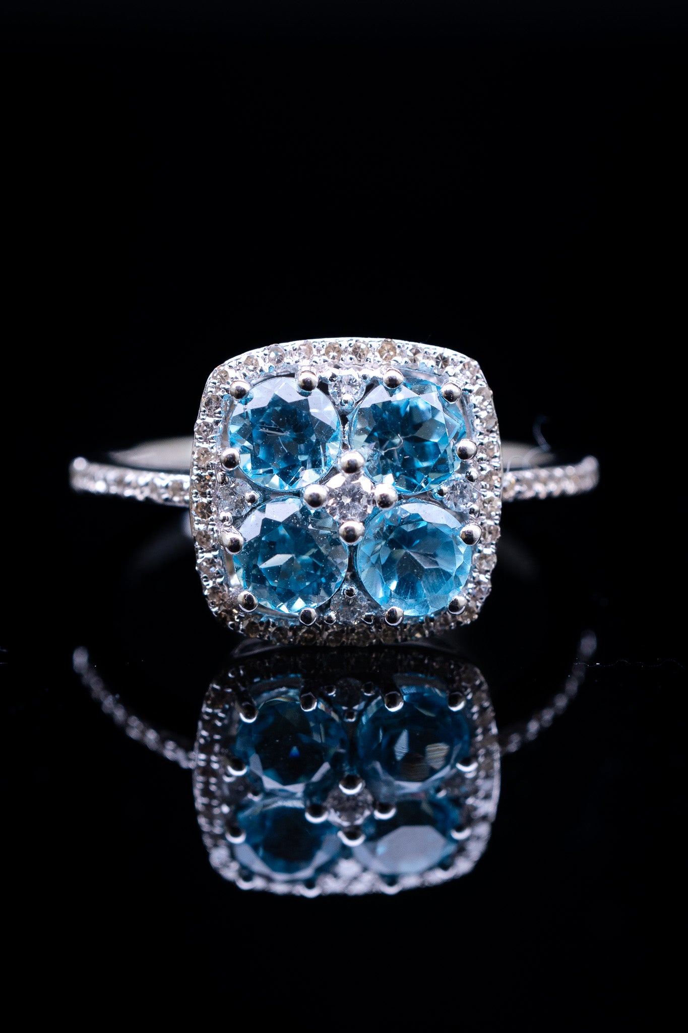 14K White Gold Light Blue Topaz & Diamond Flower Ring, 0.25 CTW, Size 7