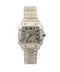 Stainless steel Cartier Santos watch with pavé diamond-set case, bezel and bracelet, Roman numeral dial and exposed screw details.