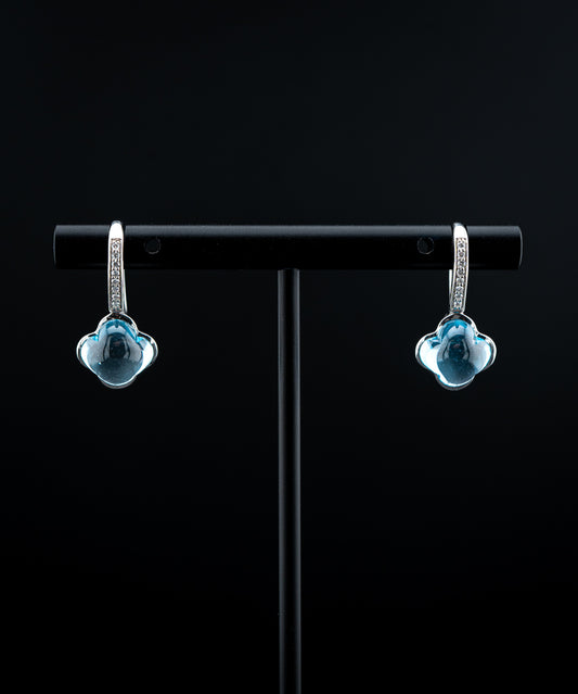 18K White Gold Hulchi Belluni Blue Topaz Flower Drop Earrings with Diamonds – 0.08 CTW