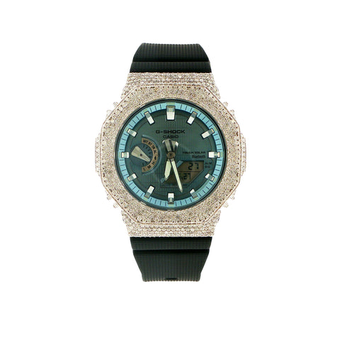 Custom iced out Casio G-Shock GBM-2100 watch with diamond bezel and ice blue analog-digital dial