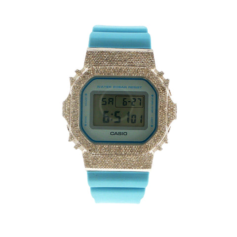 Custom iced out Casio G-Shock DW-5600SC watch with diamond bezel and baby blue rubber strap