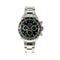 Rolex Daytona stainless steel watch with black dial, black ceramic bezel, and chronograph sub-dials